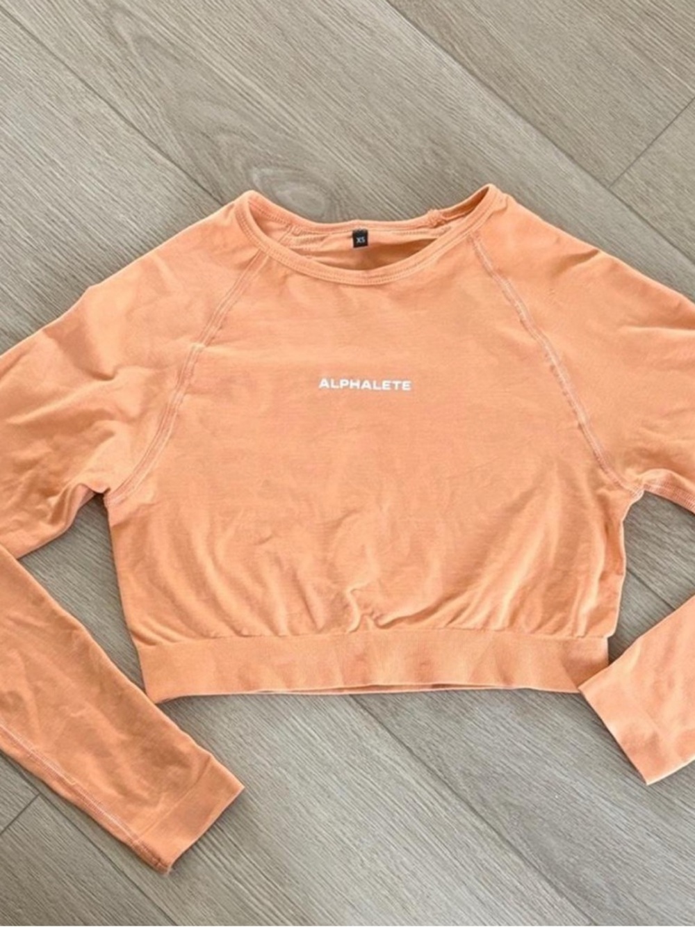 Alphalete Peach/Summer Orange Long-Sleeve Crop Top